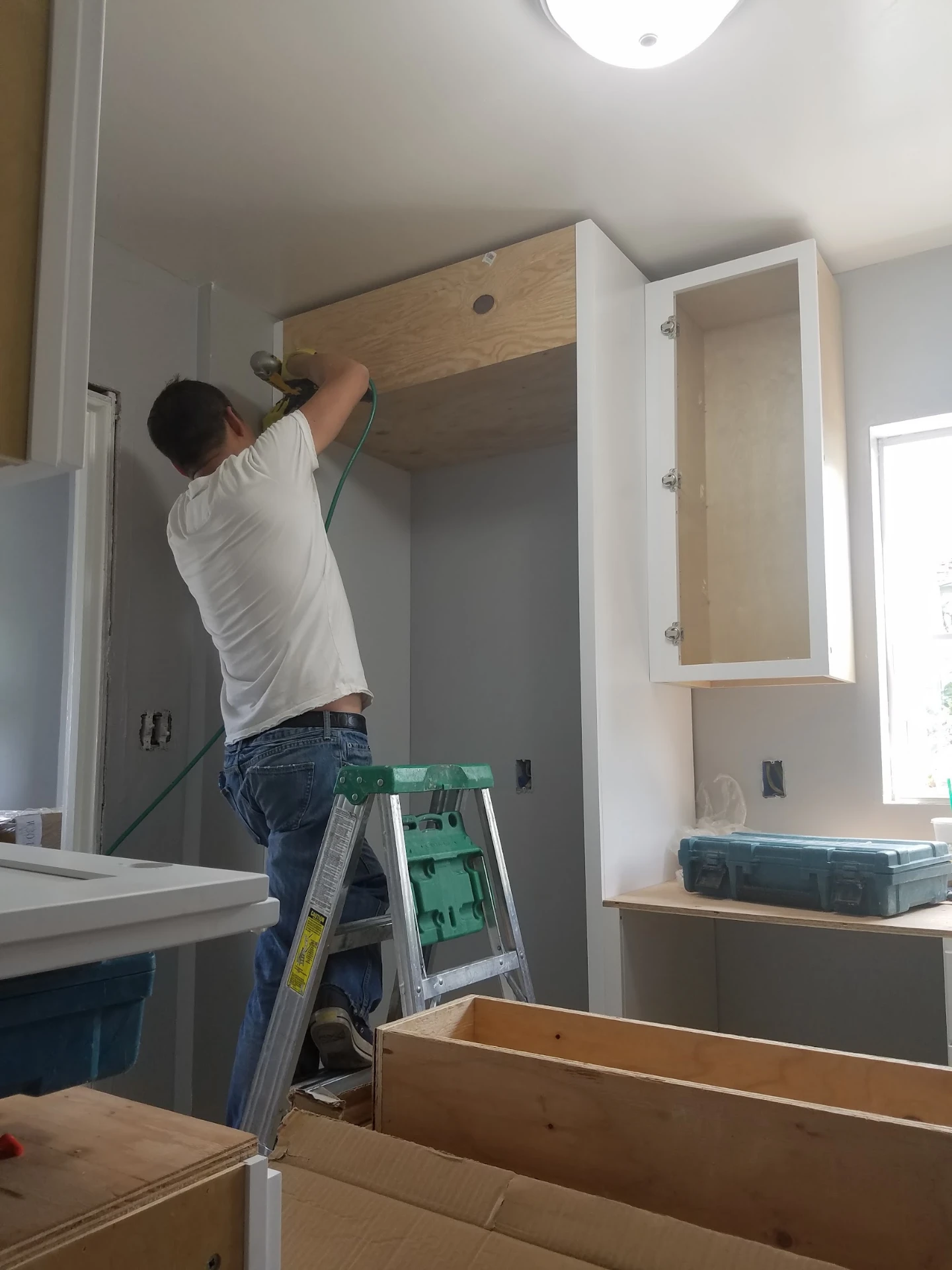 Refrigerator cabinet installation